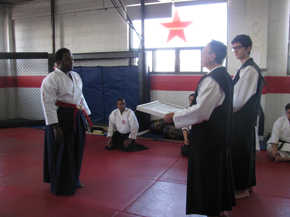 Shihan York Is Presented With A Special Gift From Sensei Briard and Sensei Neves Briard